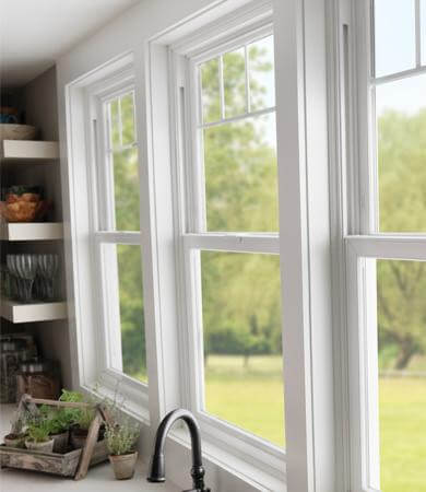 Vinyl Replacement Windows are the centerpiece of a modern kitchen