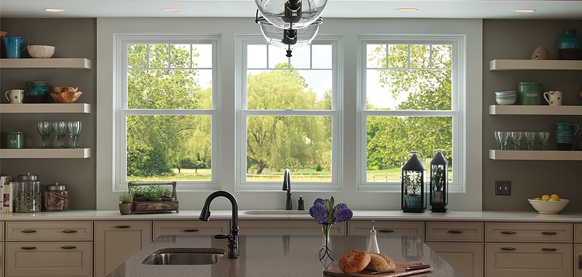 single hung window replacement example in a beautiful kitchen with open shelving